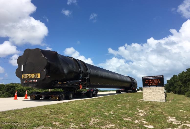 A truck delivers Falcon 9 to the Cape Canaveral launch site